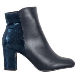 Kylie Navy blue boots on a pillar Kylie Navy blue boots on a pillar