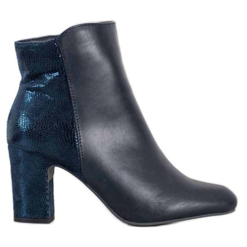 Kylie Navy blue boots on a pillar