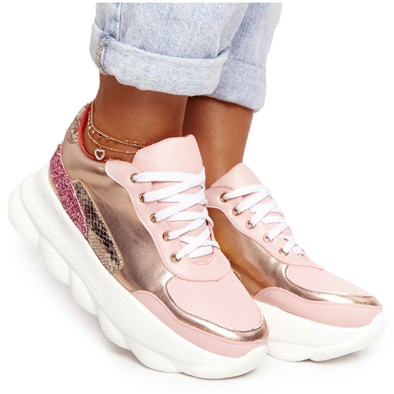 Women's sports shoes on the platform lu boo pink golden