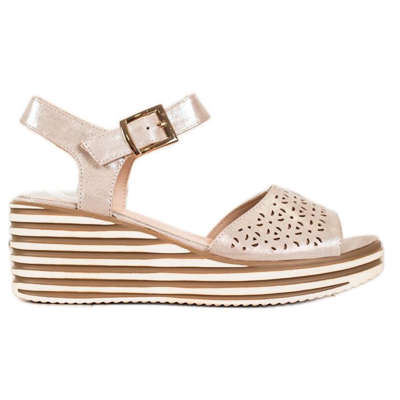 Shiny golden sandals from Sergio Leone