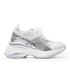 White and silver sneakers on a thick Lea sole
