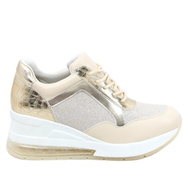 Sports shoes on a hidden wedge beige and gold RQ288 Beige golden
