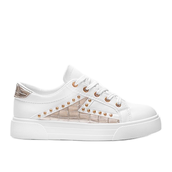 White sneakers with golden Gloria accessories