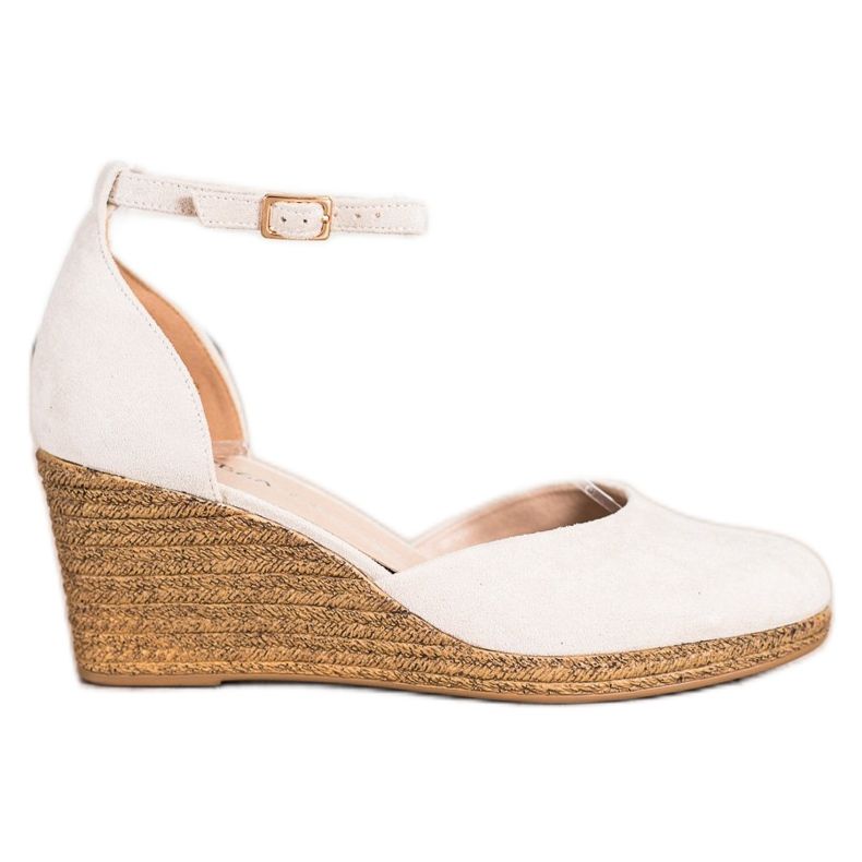 Beige pumps on the VINCEZA wedge