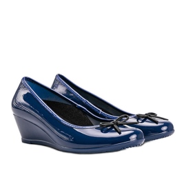 Blue Meliski ballerinas on the Garett wedge heel