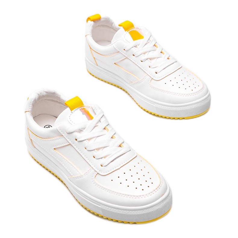 White and yellow sports sneakers from Maggie