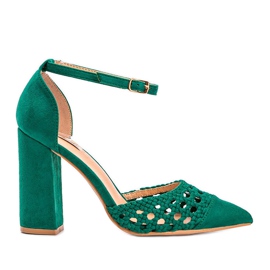 Green openwork pumps on the Hana pillar