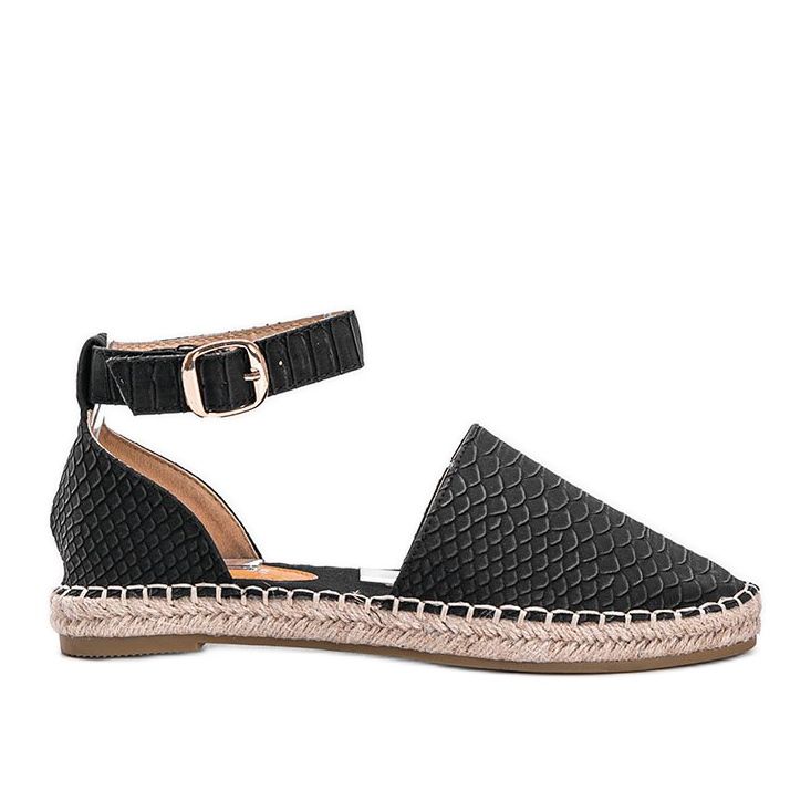 Black espadrilles with a snakeskin motif