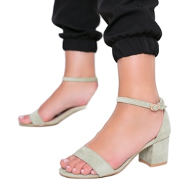 Green sandals on Beti's post