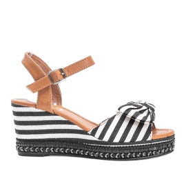 Black and white wedge sandals from Dulce