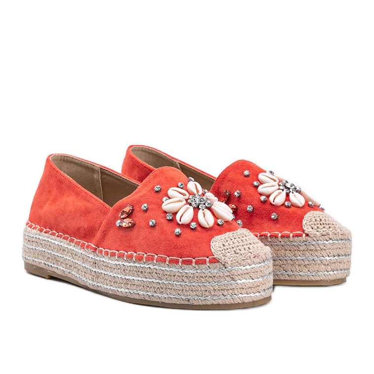 Orange espadrilles on the chunky sole of Mrs Nicki