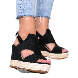 Black openwork sandals on the wedge Kristi