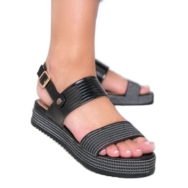 Black sandals on a chunky Senorita sole