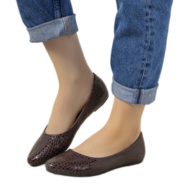 Brown patent ballerinas in a Mozzare crocodile skin pattern pink