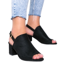 Black sandals on a post with a Blubbery upper