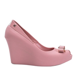 Pink melissa wedges with Ciri's bow Pink melissa wedges with Ciri's bow