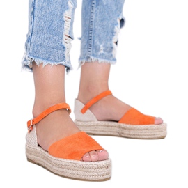 Orange sandals on the Pearl River platform