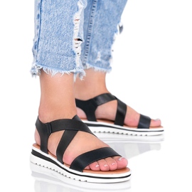 Black sandals on a thick Irony sole