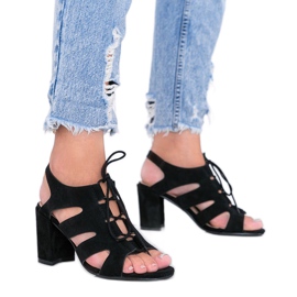 Black lace-up sandals on the Isabella post