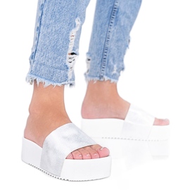 White sandals on a thick Crysta sole