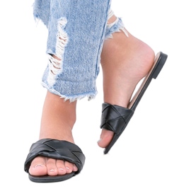 Black slippers with a braided Iren upper
