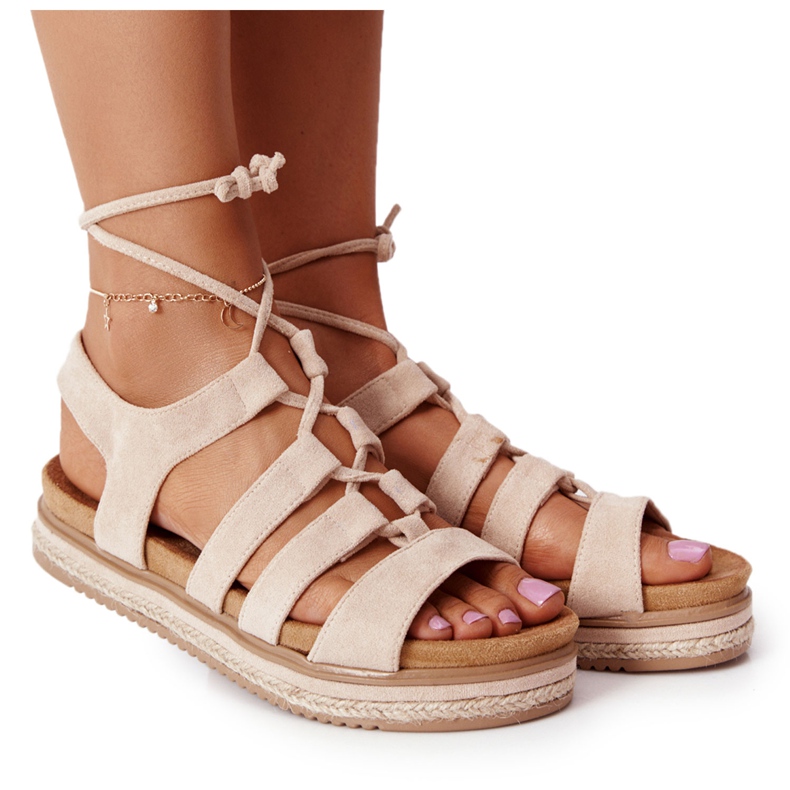 Tied Sandals On A Beige Santorini Platform