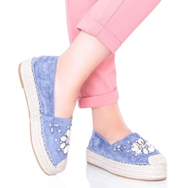 Blue espadrilles on the chunky sole of Mrs Nicki