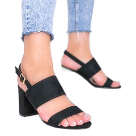 Black sandals on the Lil Sweetie post