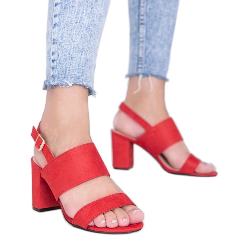 Red sandals on the post of Lil Sweetie