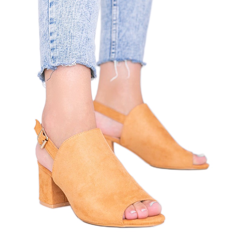 Camel sandals on a post with a Blubbery upper brown