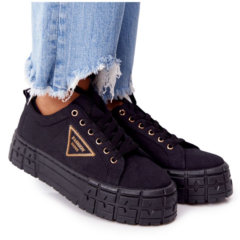 Women's Sneakers On The Black Big City Life Platform