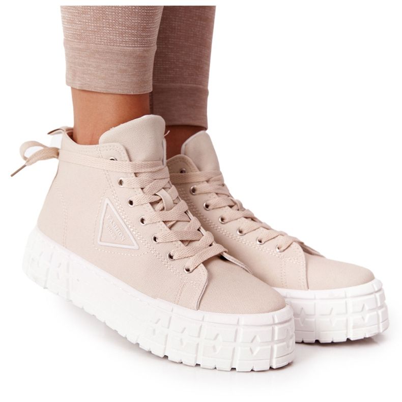 Women's High Sneakers On A Beige Manhattan Platform