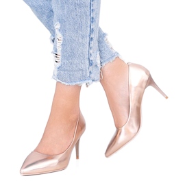 Pumps on a rose gold pin by Venicia golden