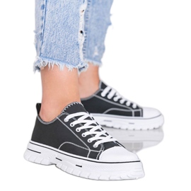 Women's black sneakers on a thick Georgia sole Women's black sneakers on a thick Georgia sole