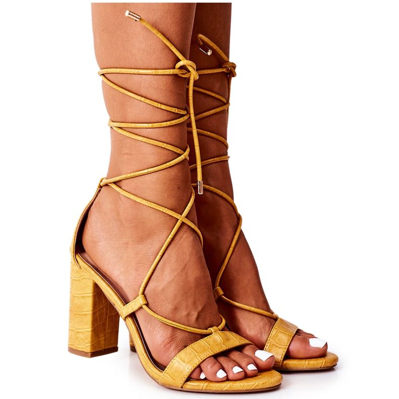 PS1 Tied Sandals On A Yellow Catwalk Bar