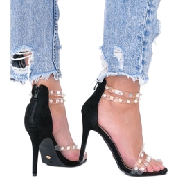 Black sandals on a high heel from Mao