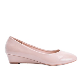 Beige pumps on a low wedge heel Chantal