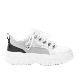 White sneakers on a high Tifel sole
