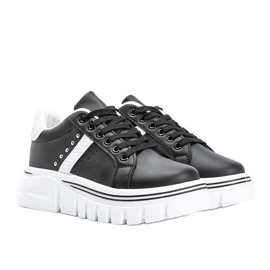 Black sneakers with white details on a high Alasana sole