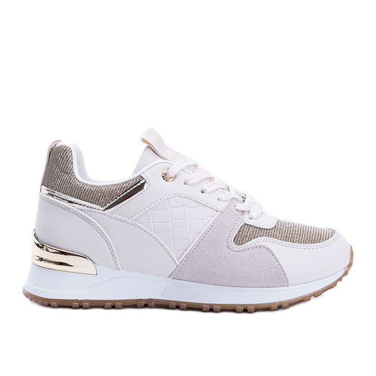 Beige sneakers with golden Yoisya accessories
