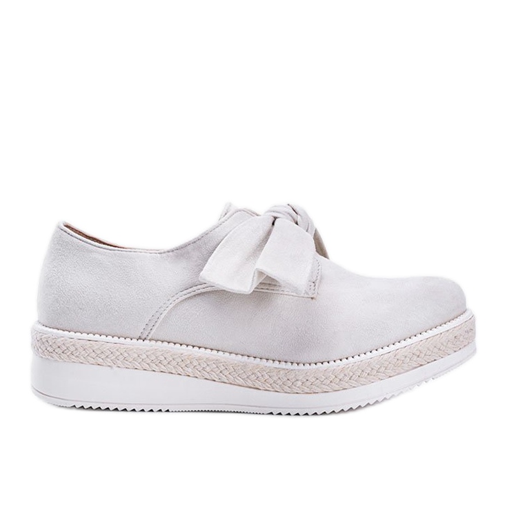 Beige shoes with a thick Sindri sole