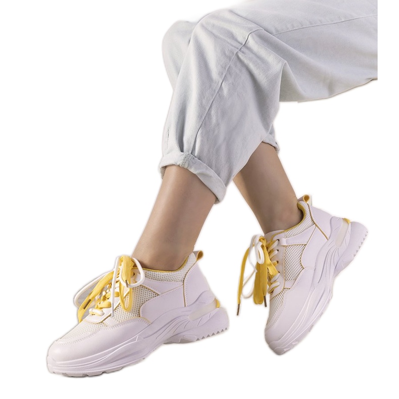 White sneakers with yellow Splitters inserts