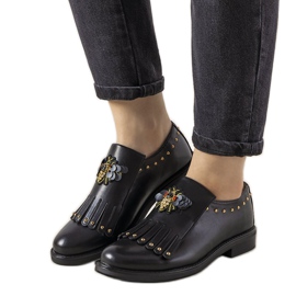 Black slip-on shoes with GF-FD9 studs