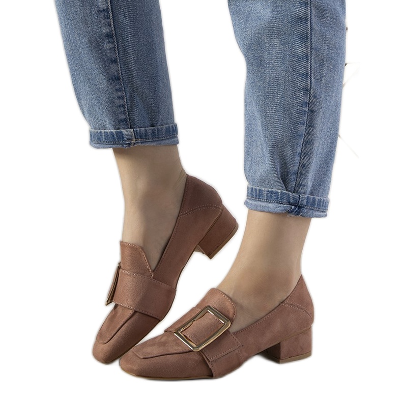 BM Pink pumps on a pillar with a Next buckle