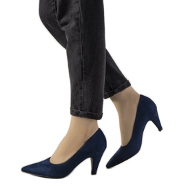Navy blue pumps on a thick Greca heel