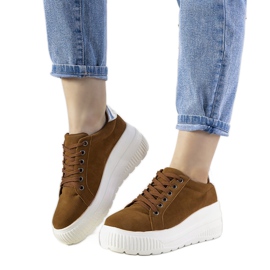 Brown sports sneakers with a high Rapter sole