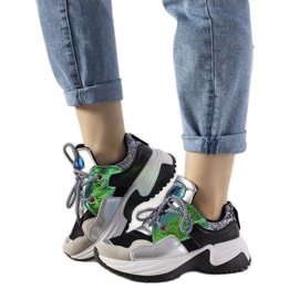 Silver sneakers with a high Spring sole black Silver sneakers with a high Spring sole black