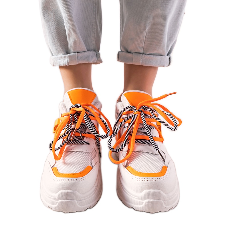 Orange and white sneakers with One Chance double lacing