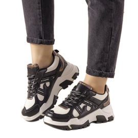 Black sneakers with holographic Allisone inserts