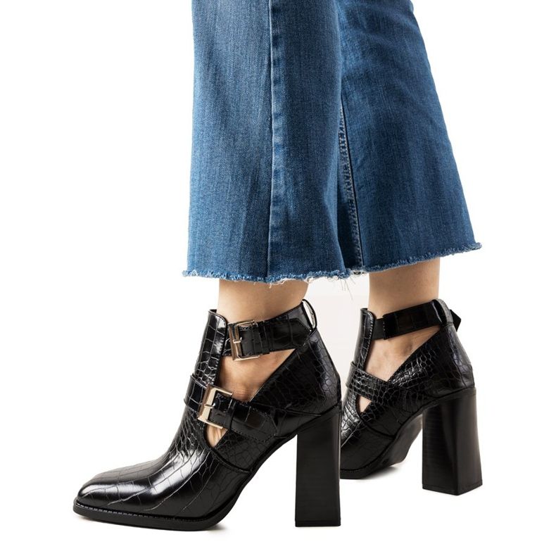 Black boots on a post in the Maybelle crocodile skin pattern